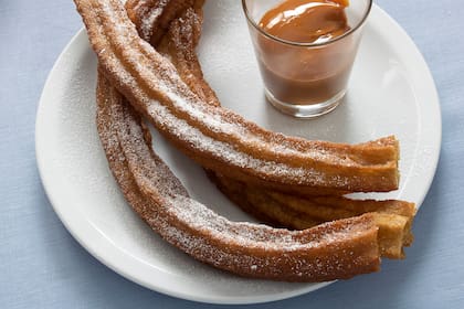Churros con dulce de leche, como en Argentina, pero diferentes.