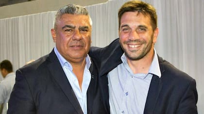 Claudio Chiqui Tapia con Andrés Paton Urich, abogado de la AFA