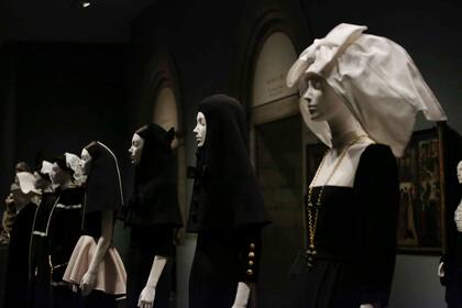 Clothes are on display during the Press Preview for the annual fashion exhibition &quot;Heavenly Bodies: Fashion and the Catholic Imagination&quot; at The Metropolitan Museum of art on May 7, 2018 in New York / AFP PHOTO / KENA BETANCUR