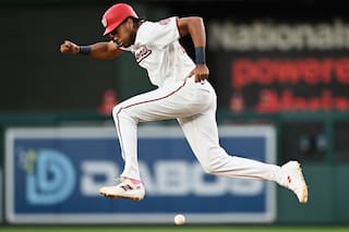 Con grand slam de Woods dentro del parque, Nacionales remontan y vencen 9 a 6 a Mets