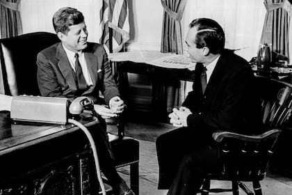 Con John Fitzgerald Kennedy en una reunión en la Casa Blanca. Era 1961.