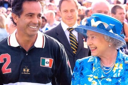Con la reina de Inglaterra, su admiradora