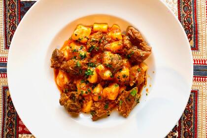 Con ragú de ternera al estilo de La Dorita