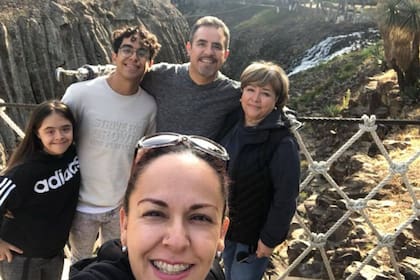 Con su familia, en un viaje