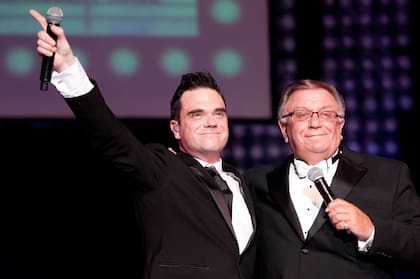 Con su padre, en mayo de 2012, cuando cantaron juntos