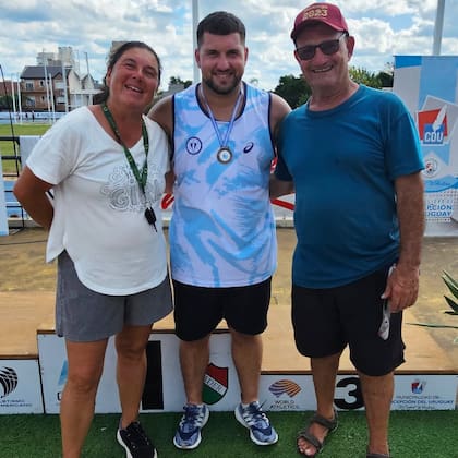 Con sus padres, Analía (que también fue atleta) y Daniel