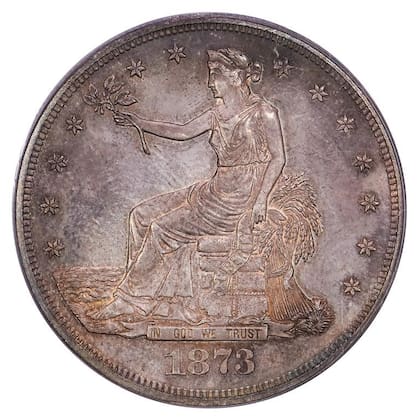 Con un peso ligeramente superior a la de emisiones de plata estándar, el dólar comercial estaba destinado exclusivamente a la exportación