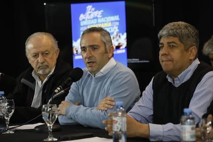 Andrés Larroque junto a Hugo Yasky y Pablo Moyano