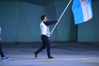 Conte, en el momento de portar la bandera nacional en el desfile