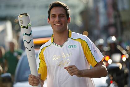 Crismanich con la antorcha de Río 2016