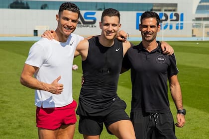 Cristiano Ronaldo junto a Diogo Dalot