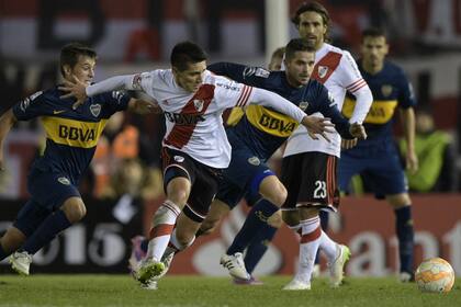 Cubas, Kranevitter, Gago y Ponzio, los cuatro volantes centrales de River y Boca; los del millonario, las figuras del partido