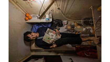 Un residente que sólo dio su apellido Yeung descansa