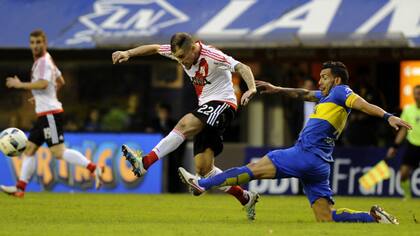 D''Alessandro y Tevez, en el último superclásico