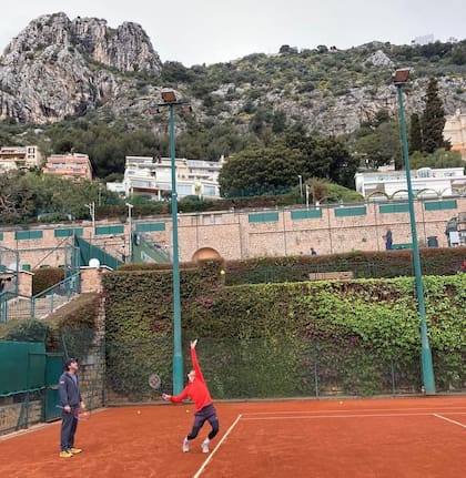 Dante Bottini junto con Grigor Dimitrov, durante una práctica en Montecarlo