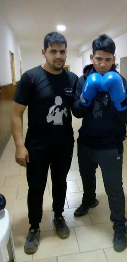 David, junto a su instructor