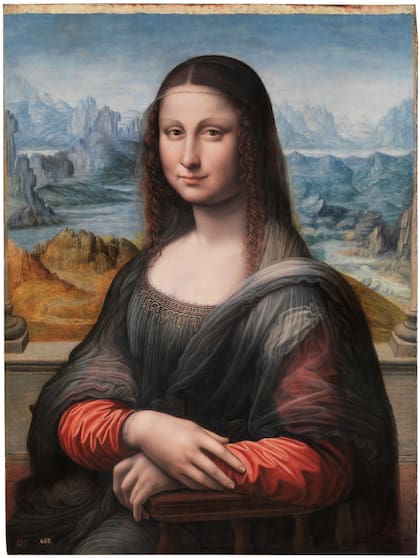 Del taller de Da Vinci proviene este óleo del Museo del Prado: mientras la auténtica Gioconda está pintada de negro y amarillo, la de Madrid lleva velo blanco y vestido rojo
