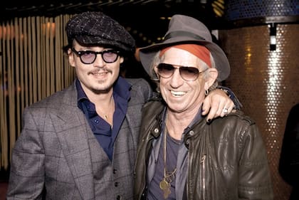 Depp con su amigo Keith Richards, que hizo de su padre en Piratas del Caribe.
