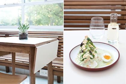 Detalle de las mesas con extremos rebatibles y uno de los platos estrella de Narda Comedor: el akusay con crema de hierbas