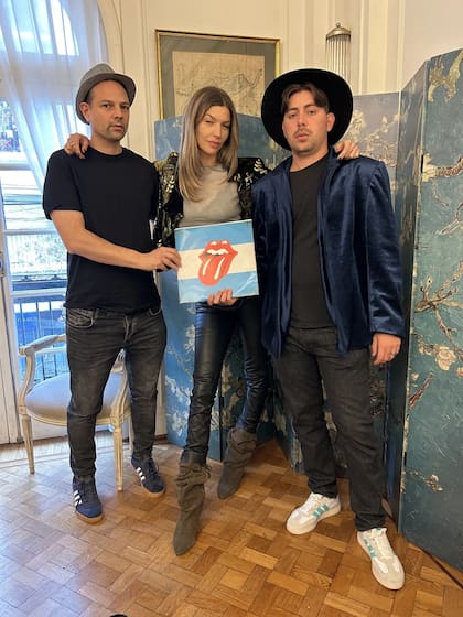 Diego Páez Vilaró con Gabriel Grieco, director del documental Argentina Stone, y Chloé Bello