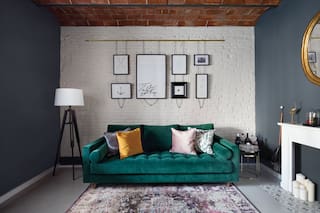 Con tonos oscuros y texturas elegantes subió de categoría este depto de 60m2