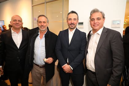 Domingo Speranza (Newmark), Miguel Camps (Argencons), Carlos Spina (Argencons) y Jorge Cruces (IRSA)