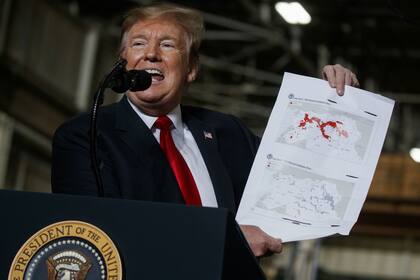 Donald Trump muestra el retroceso del Estado Islámcio.