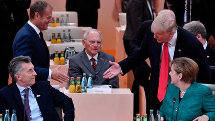 Donald Tusk, Donald Trump, Macri y Angela Merkel en la exposición sobre empleo en la cumbre del G-20