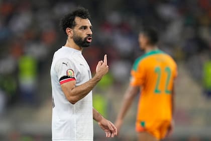 Egypt's captain Mohamed Salah gestures during the African Cup of Nations 2022 round of 16 soccer match between Ivory Coast and Egypt at the Japoma Stadium in Douala, Cameroon, Wednesday, Jan. 26, 2022. (AP Photo/Themba Hadebe)