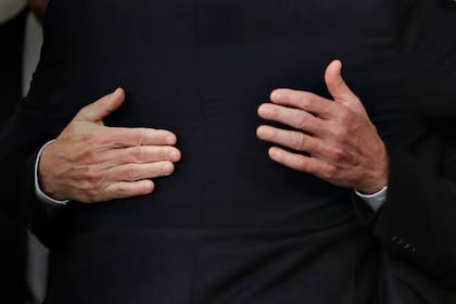 Un ángulo diferente del abrazo de Mauricio Macri y Alberto Fernández