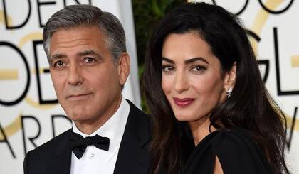 El actor George Clooney y su esposa Amal Clooney. Esta imagen es cuando llegan a la alfombra roja para la 72° entrega anual de los Globos de Oro, el 11 de enero de 2015 en el Beverly Hilton
