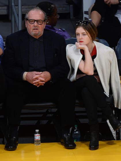 El actor junto a su hija, disfrutando de un partido de Los Angeles Lakers, en 2014