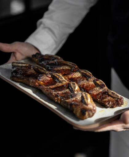 El asado de tira siempre sale perfecto en Happening.