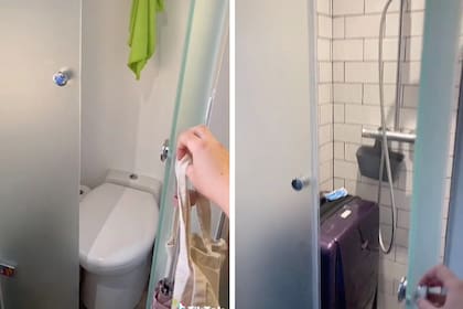 El baño está escondido tras puertas de vidrio opacas