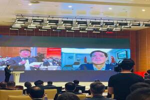 El chairman de Cofco, Jun Lyu, y Alfonso Romero, el ejecutivo argentino premiado por la empresa