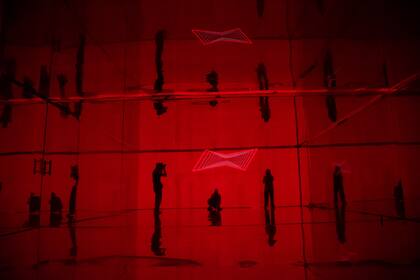 El cuarto se tiñe del emblemático rojo de la marca.