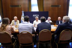 El director de ARCA, Juan Pazo, en el centro