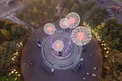 El diseño del monumento consta de cinco esculturas multicolores iluminadas que se parecen al virus COVID-19 y a un diente de león (COVID Monument Commission)