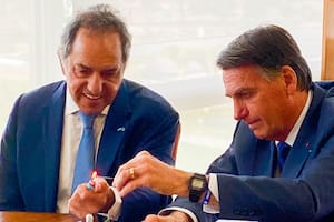 El embajador Daniel Scioli junto al presidente de Brasil, Jair Bolsonaro, en el palacio del Planalto.