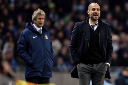 El entrenador reemplazará en Manchester City a quien aparece detrás suyo: Manuel Pellegrini