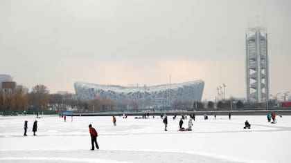 El estadio Nido de Pájaro está de nuevo en el foco de los Juegos Olímpicos en China, pero es un momento muy diferente para el país