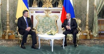 El expresidente de Ucrania Viktor Yanukovich y el actual presidente de Rusia Vladimir Putin