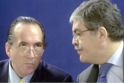 El extitular del ente binacional Yaciretá Oscar Thomas junto al exministro Julio De Vido