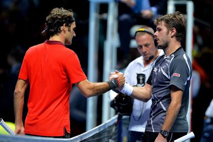 El frío saludo entre Federer y Wawrinka