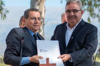 El gobernador de Catamarca, Raúl Jalil, y el asesinado ministro de Desarrollo Social, Juan Carlos Rojas