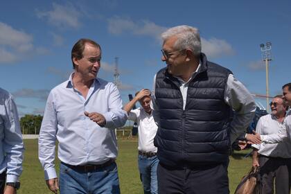 El gobernador de Entre Ríos, Gustavo Bordet, y el ministro de Agricultura, Julián Domínguez