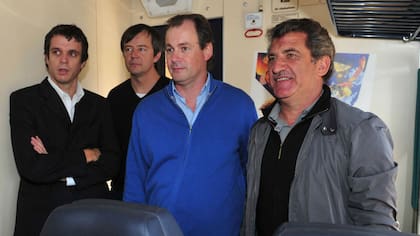 El gobernador de Entre Ríos, Gustavo Bordet, junto al exgobernador Sergio Urribarri