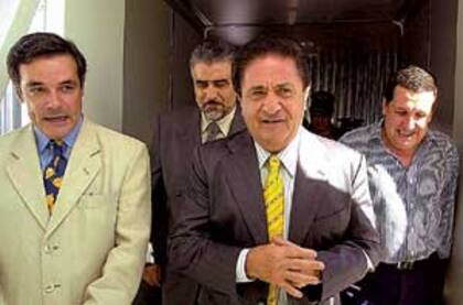 El entonces gobernador Rovira, el expresidente Duhalde y el exsenador Puerta, en Misiones