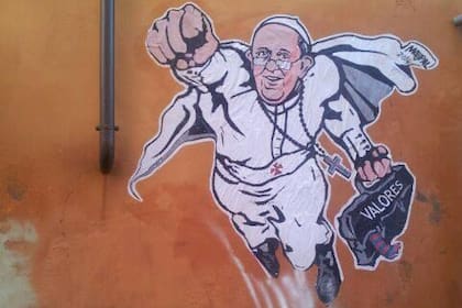 El graffiti del papa Francisco retratado como un superhéroe