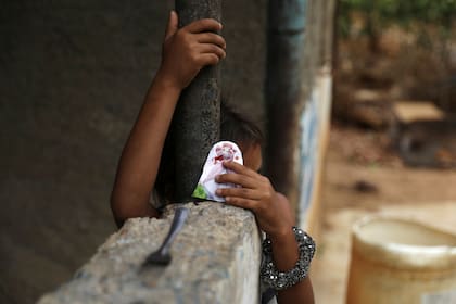 Judimar, hermana de José Alfredo y Anderson Torres, quienes murieron después de ser baleados por miembros de la Fuerza de Acción Especial de la Policía Nacional de Venezuela